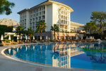 hotel next to an outdoor pool
