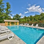 outdoor pool with chairs